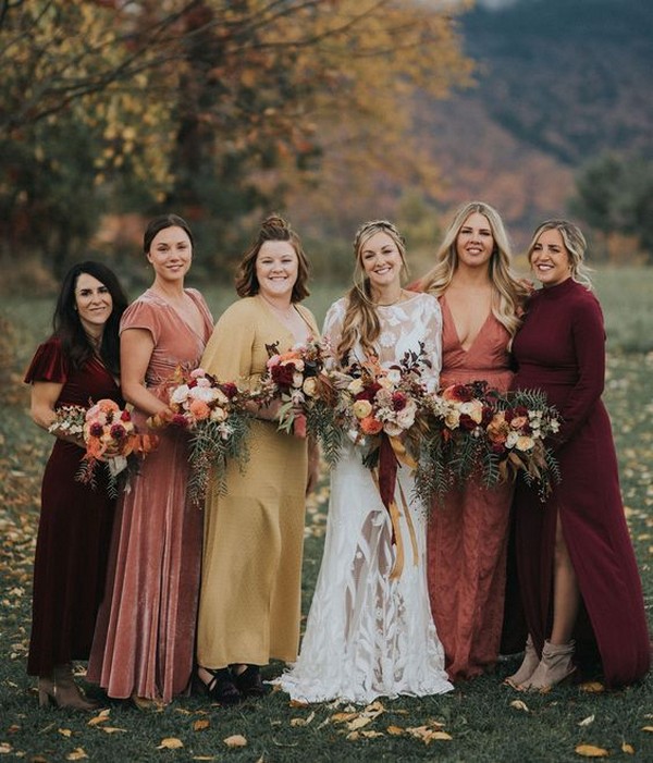 Burgundy bridesmaids and some of the warmest fall colors for this autumnal wedding