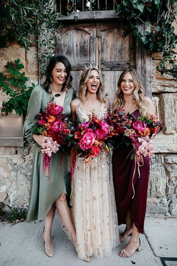 Mismatched bridesmaids with unstructured pink bouquets