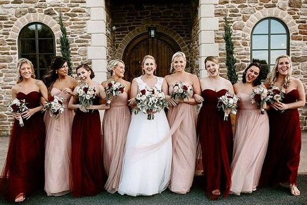 mismatched bridesmaid dresses in blush and burgundy