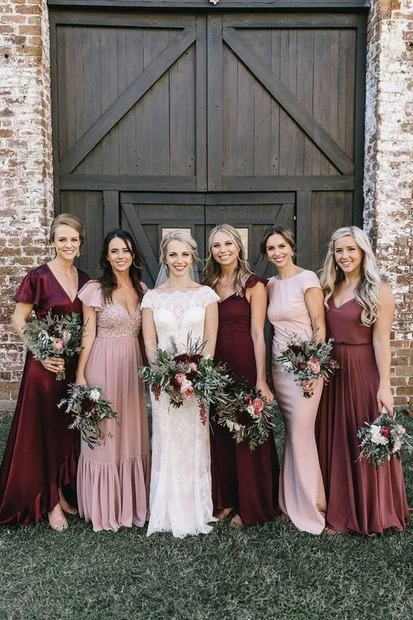 blush wedding dress with burgundy bridesmaids